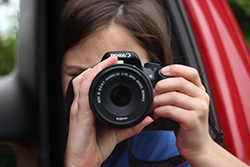 Female using a camera