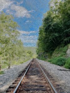 A train track going into the blue sky