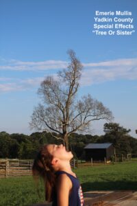 Girl Eating a Tree